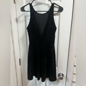 Black low back crushed velvet mini dress can be worn two ways